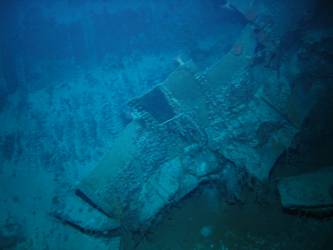 Large pieces of twisted steel plate on seabed